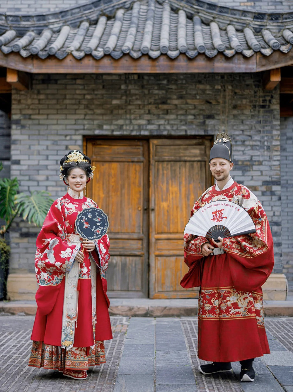 Tourist enjoying Hanfu immersive experience in Beijing near Forbidden City ancient walls
