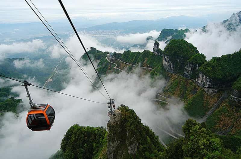 Tianmen Mountain — Cable Car, Cliffside Walkways & Tianmen Cave; Transfer to Fenghuang Ancient Town — Zhangjiajie / Fenghuang